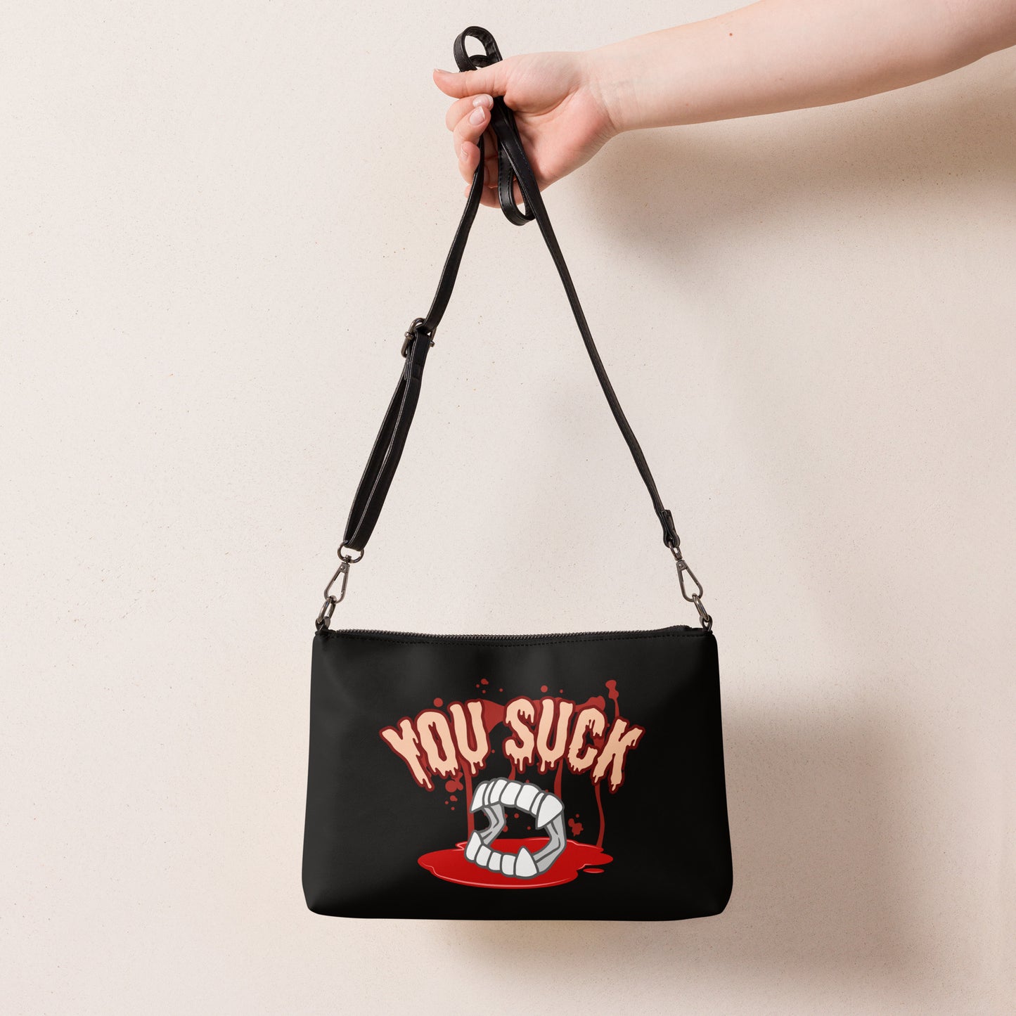 You Suck Crossbody bag